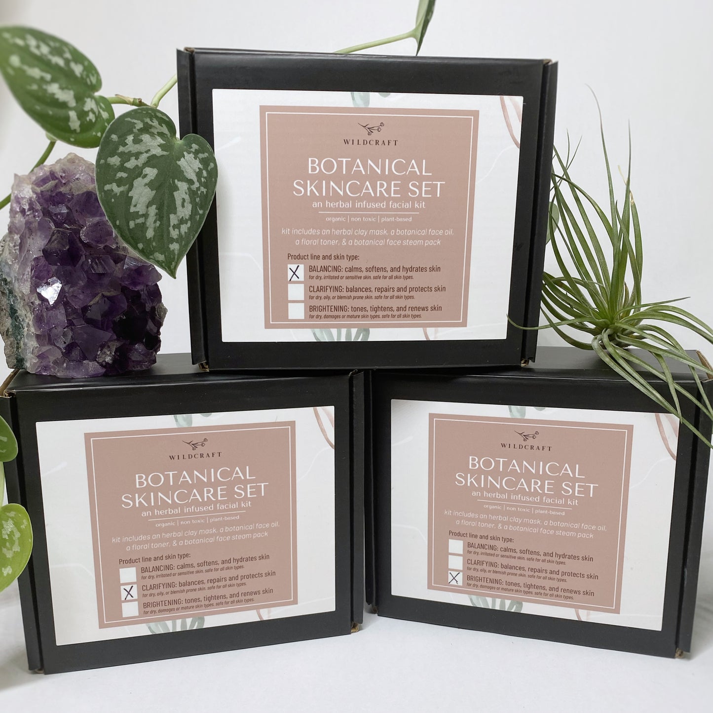Botanical skincare set for an organic, plant-based, herbal infused at home facial. Kit includes a botanical face oil, a floral toner, an herbal clay mask, and a botanical face steam pack. All products are handmade, small batch, non-toxic, and plant based.