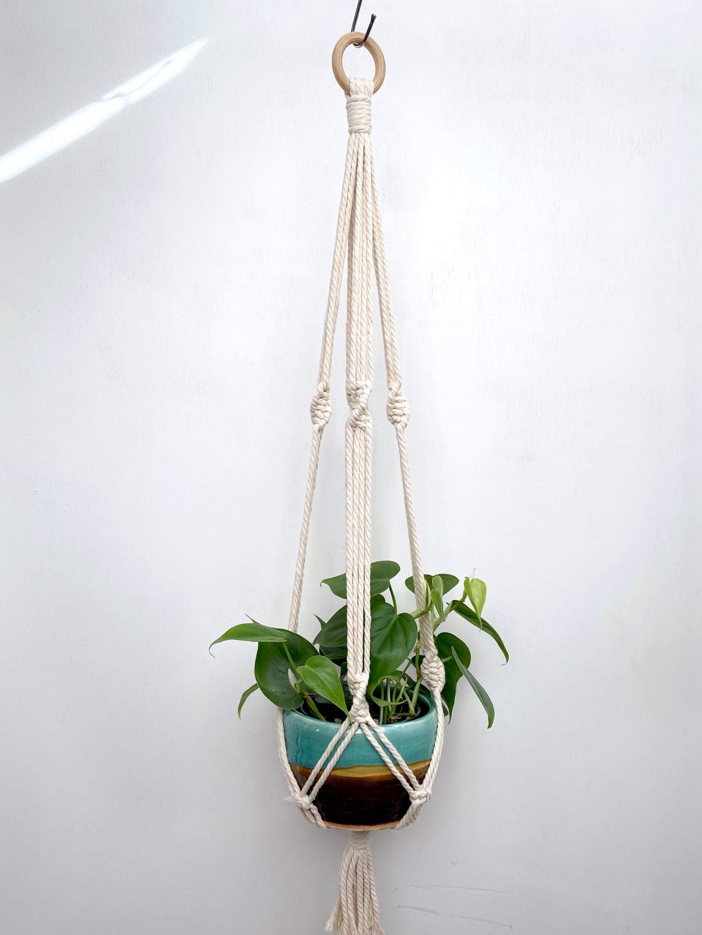 Create more space in your home and suspend your urban jungle with a ready to hang, handmade, boho macrame plant hanger. Great for indoors or outdoors, just add your favorite plant!