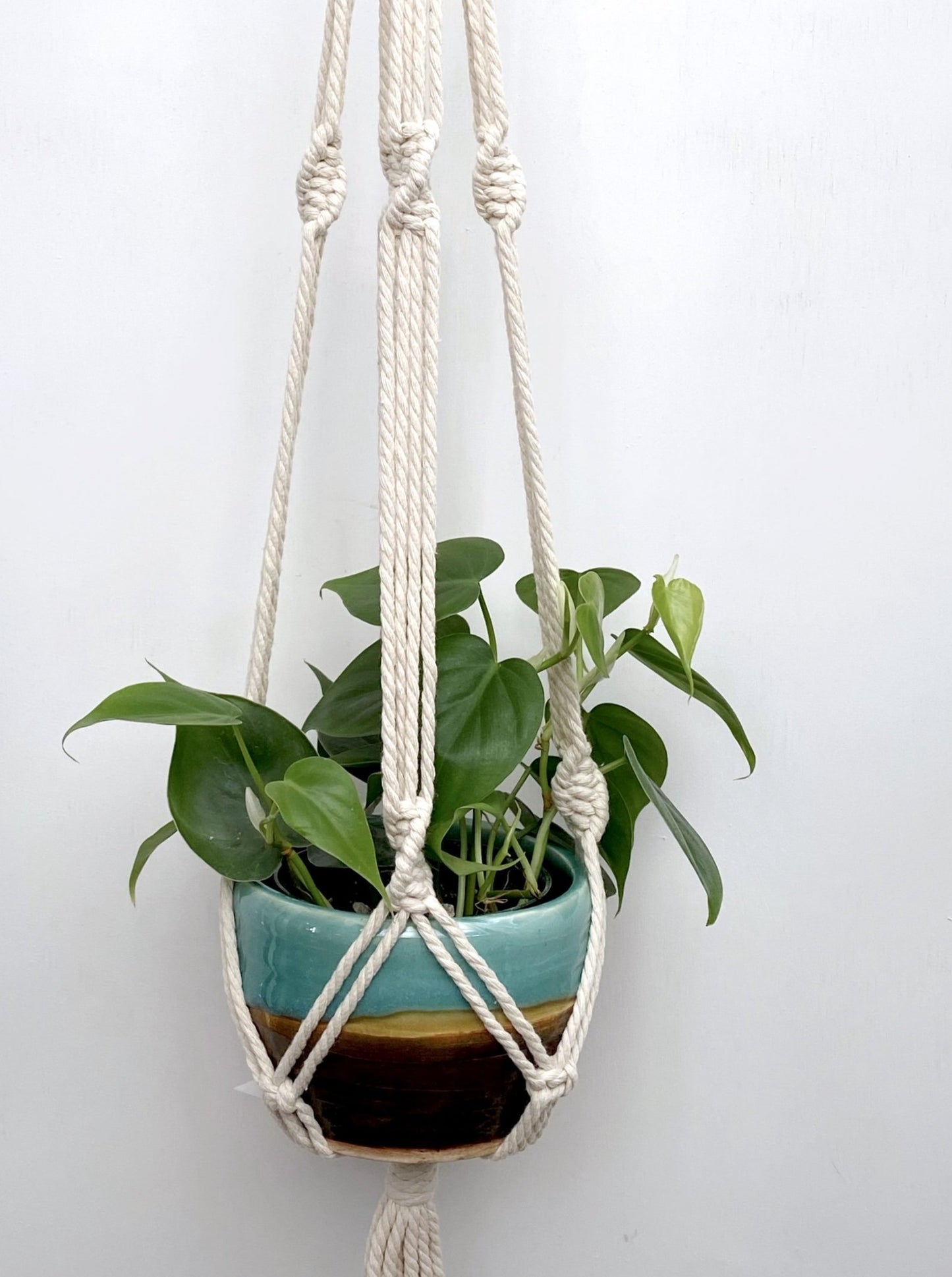 Create more space in your home and suspend your urban jungle with a ready to hang, handmade, boho macrame plant hanger. Great for indoors or outdoors, just add your favorite plant!