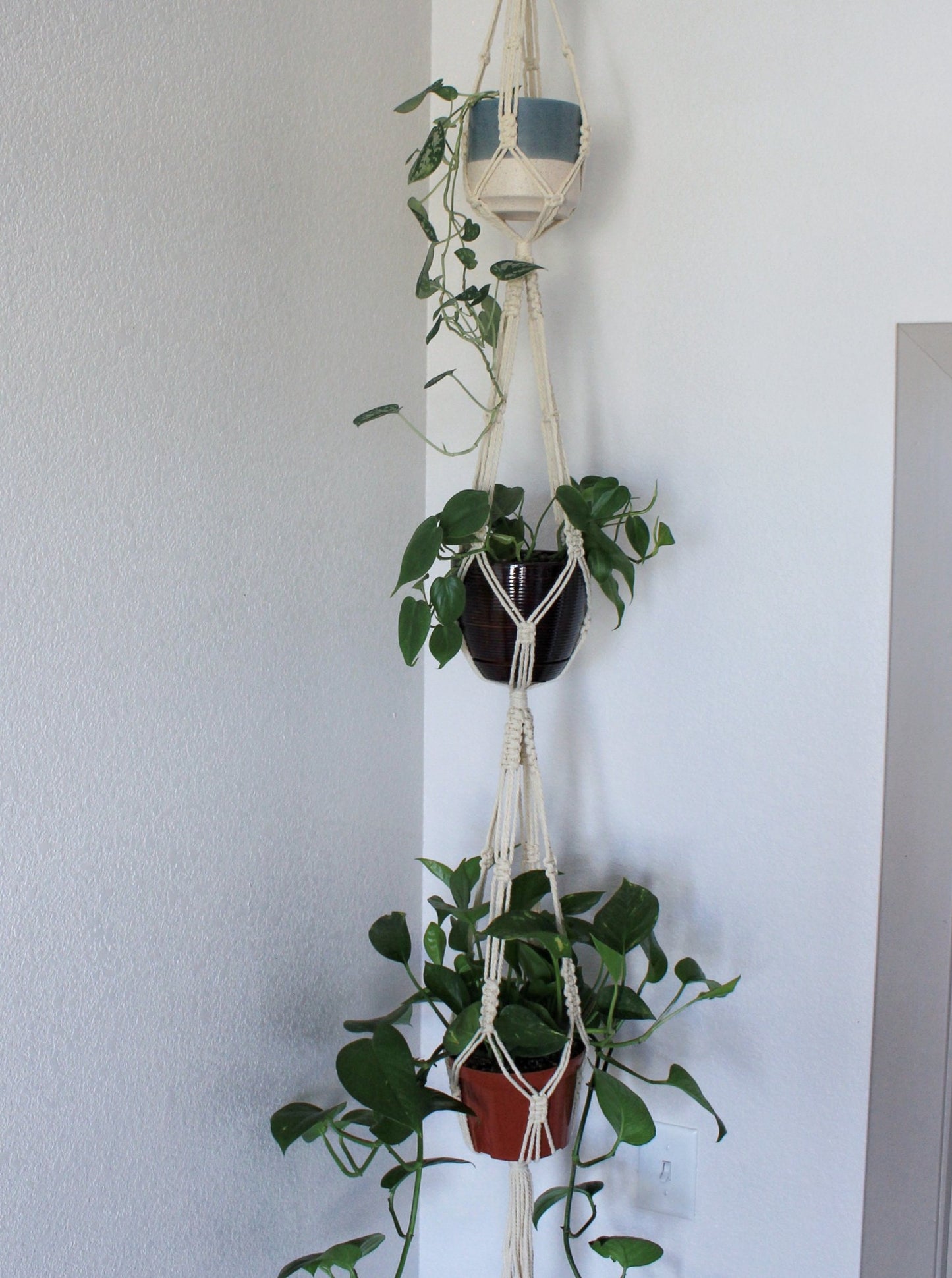 Create more space in your home and suspend your urban jungle with a ready to hang, handmade, boho triple macrame plant hanger. This hanger is perfect for high ceilings! Great for indoors or outdoors, just add your favorite plants!