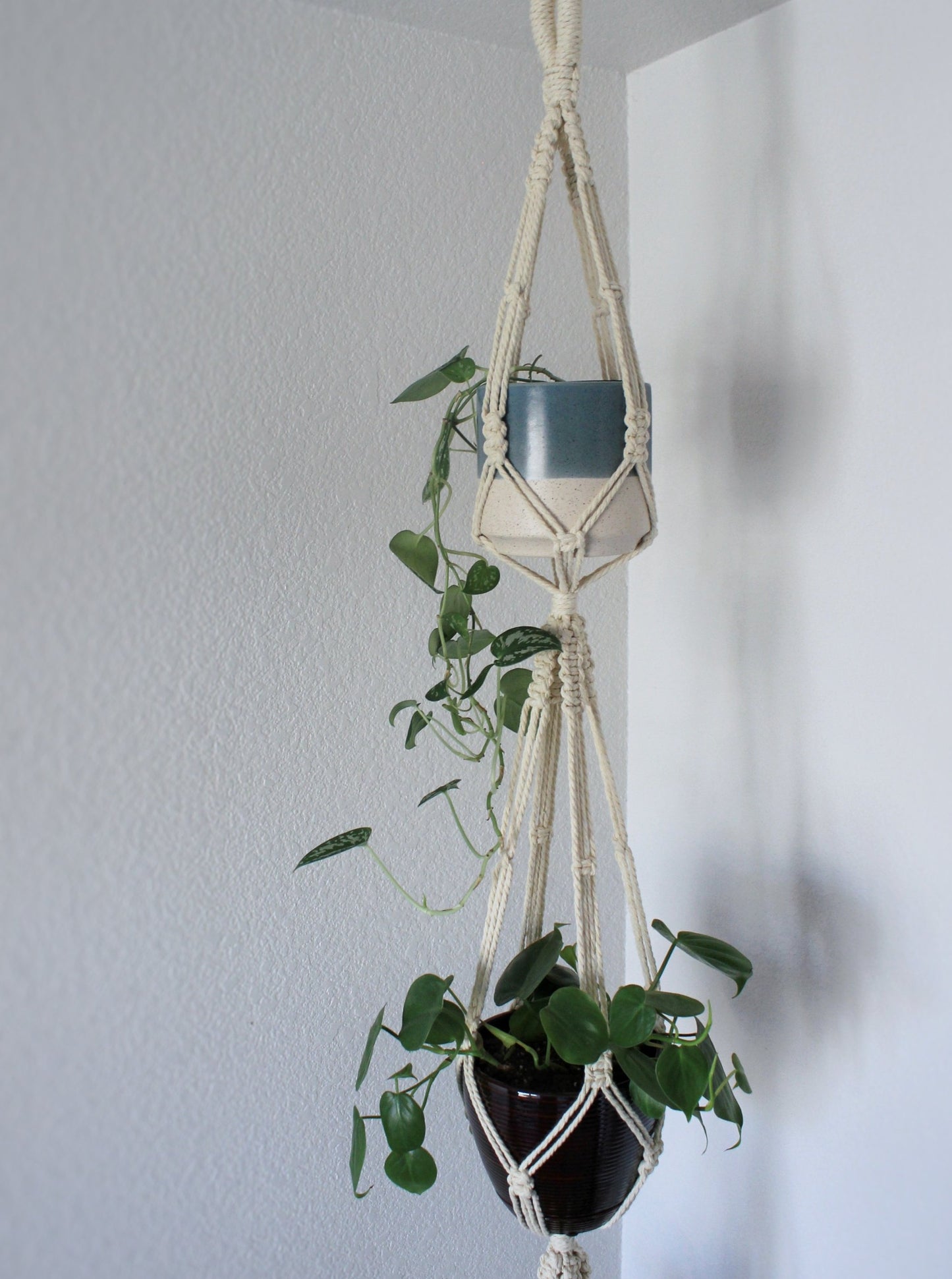 Create more space in your home and suspend your urban jungle with a ready to hang, handmade, boho triple macrame plant hanger. This hanger is perfect for high ceilings! Great for indoors or outdoors, just add your favorite plants!