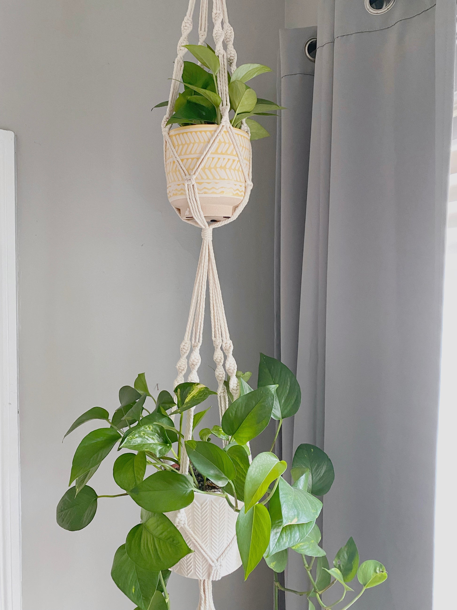 Create more space in your home and suspend your urban jungle with a ready to hang, handmade, boho double macrame plant hanger. This hanger is perfect for high ceilings! Great for indoors or outdoors, just add your favorite plants!